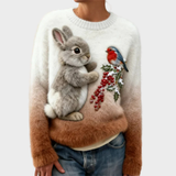 Lucy | Pull en peluche avec un lapin de Noël