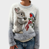 Lucy | Pull en peluche avec un lapin de Noël