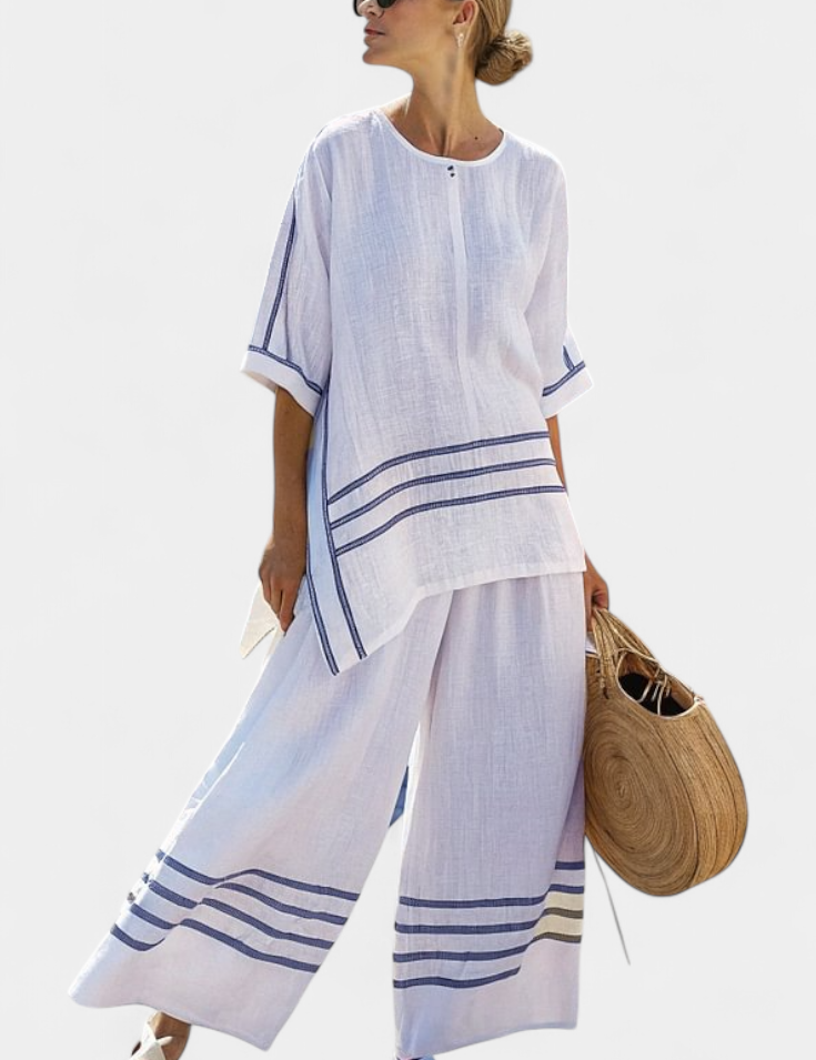 Vittorina – top asymétrique à rayures sophistiqué et pantalons audacieux