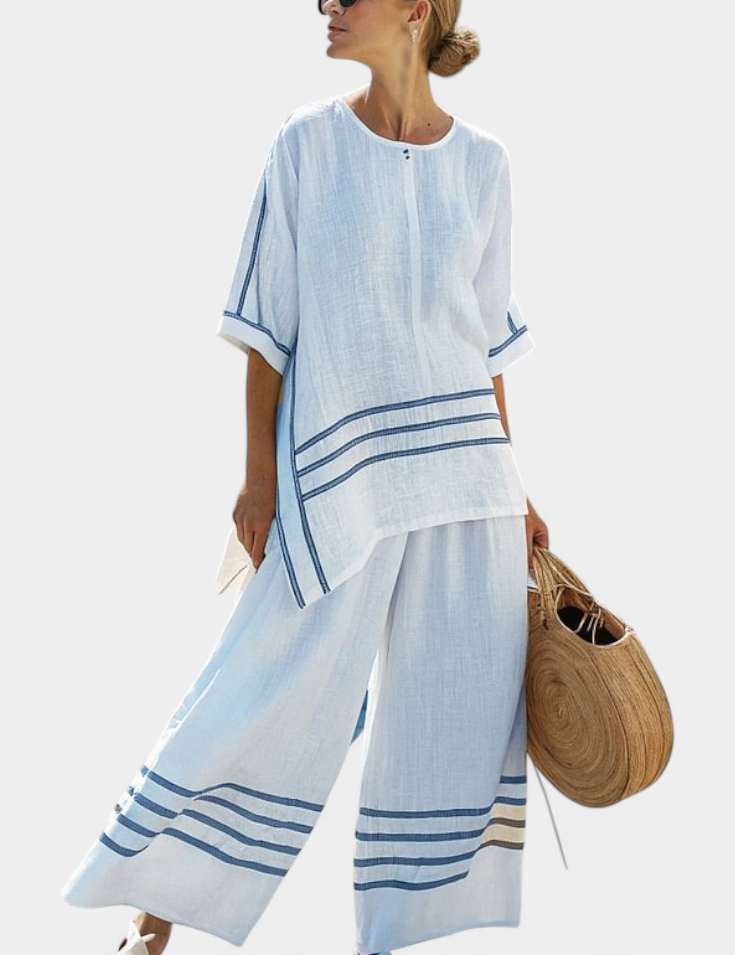 Vittorina – top asymétrique à rayures sophistiqué et pantalons audacieux