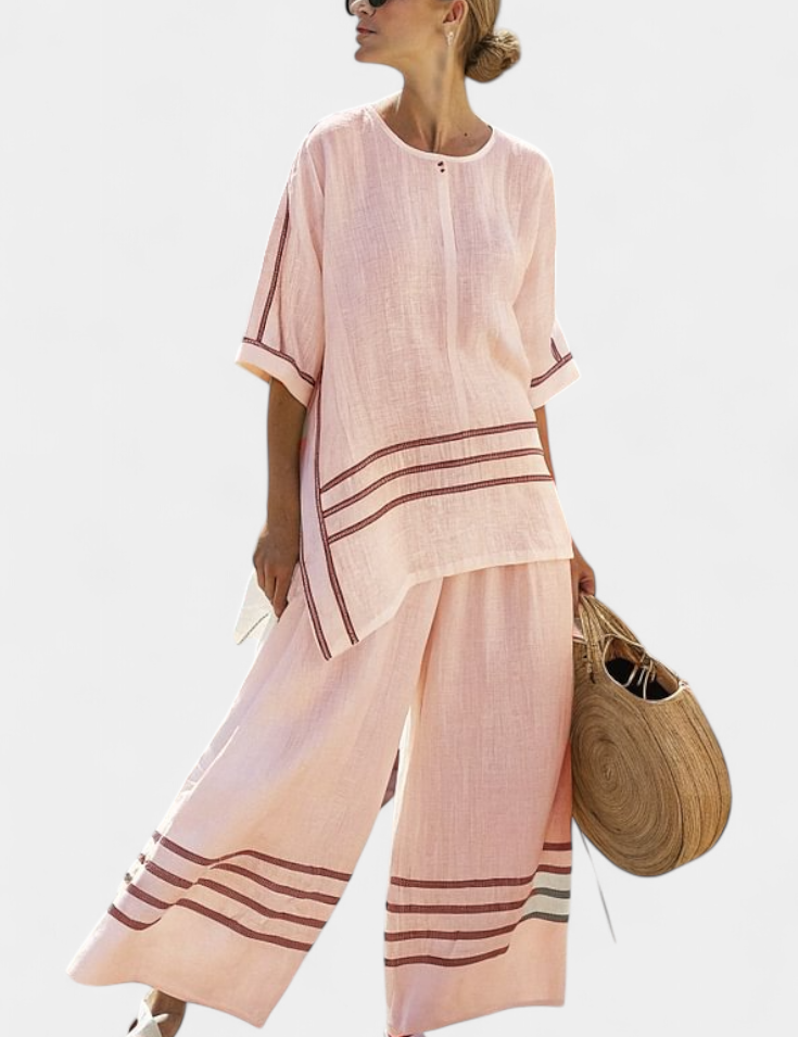 Vittorina – top asymétrique à rayures sophistiqué et pantalons audacieux