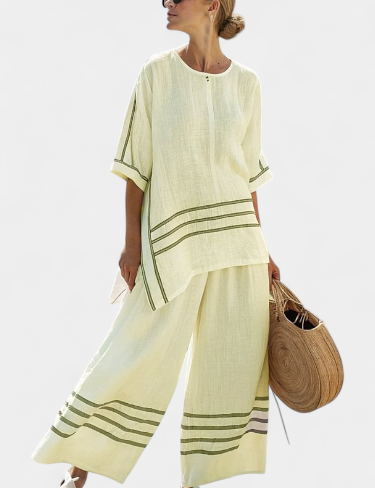 Vittorina – top asymétrique à rayures sophistiqué et pantalons audacieux