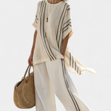 Raffaella – blouse beige élégante et pantalons à rayures noires