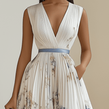 Chloé | Robe midi plissée en chiffon floral blanc avec décolleté en V
